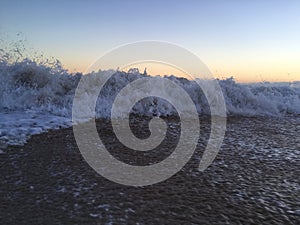 Pacific Ocean Waves at Beach in Kekaha during Sunset on Kauai Island, Hawaii.