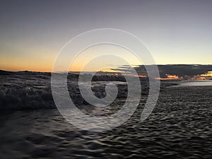 Pacific Ocean Waves at Beach in Kekaha during Sunset on Kauai Island, Hawaii.