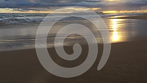 Pacific Ocean Waves at Beach in Kekaha during Sunset on Kauai Island, Hawaii.