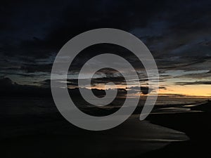 Pacific Ocean Waves at Beach in Kekaha during Sunset on Kauai Island in Hawaii.