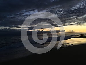 Pacific Ocean Waves at Beach in Kekaha during Sunset on Kauai Island in Hawaii.