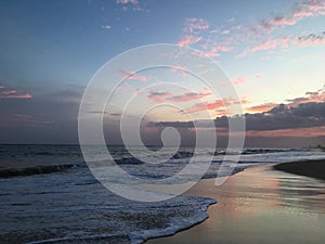 Pacific Ocean Waves at Beach in Kekaha during Sunset on Kauai Island, Hawaii.