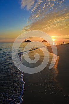 Pacific sunrise at lanikai beach, hawaii