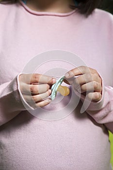 Pacifier in woman hands photo