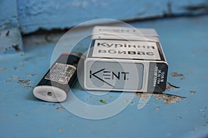 Pack of cigarettes and a lighter