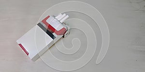 A pack of cigarettes in a white background