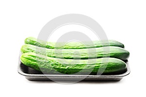 Pack of cucumbers isolated on white