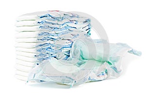 Pack of diapers and used diaper