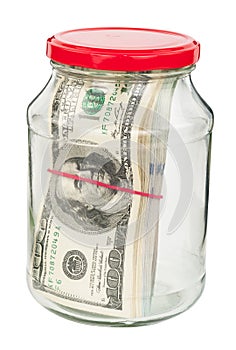 Pack of dollars in a glass jar