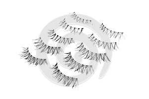 pack of false eyelashes isolated on white