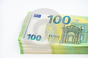 A pack of notes 100 hundred euros. European currency. On white background. Part of a batch of money. Blank for