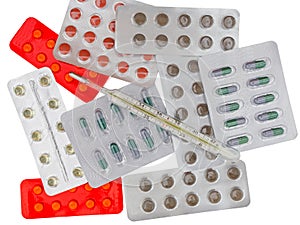 Pack of pills and termometer photo