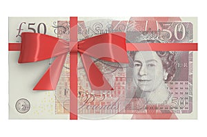 Pack of 50 pound sterling banknotes with red bow, gift concept.