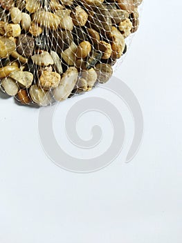 a pack of river stones to decorate ornamental plants, aquariums, pots on a white background