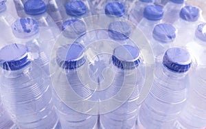 Pack of small shrink-wrapped water bottles