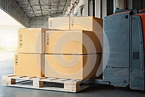 Package Boxes Stack on Wooden Pallets to Send to Customers. Warehouse Shipping. Supply Chain, Supplies Shipment.