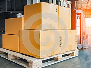 Package Boxes Stack on Wooden Pallets to Send to Customers. Warehouse Shipping. Supply Chain, Supplies Shipment.