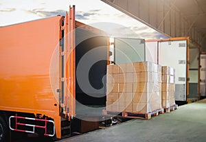 Package Boxes Stacked on Pallets Loading into Container Truck. Warehouse Shipping. Shipment. Freight Truck Logistics Transport.