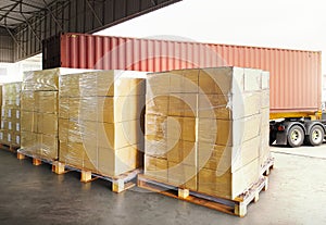 Package Boxes Wrapped Plastic Stacked on Pallets. Distribution Warehouse Shipping. Freight Truck Logistic Transpor