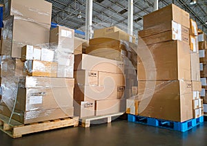 Package Boxes Wrapped Plastic Stacked on Pallets. Storage Warehouse, Supplies Warehouse Logistics.