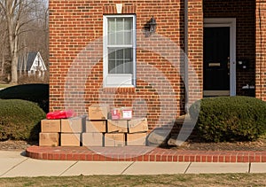 Package delivery on doorstep. Boxes and postal delivery on modern brick home doorstep Generative AI