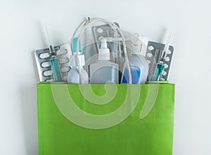 Package with medicines, tablets, sprays, thermometer, syringes. Drug delivery from the pharmacy