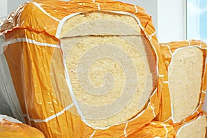 Packages of thermal insulation material indoors, closeup