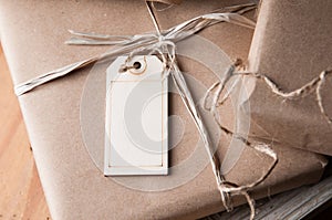 Brown paper packages wrapped up with string