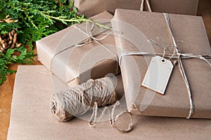 Brown paper packages wrapped up with string