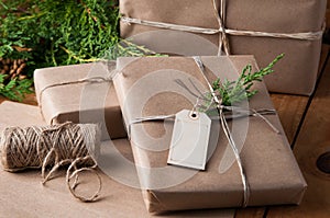 Brown paper packages wrapped up with string
