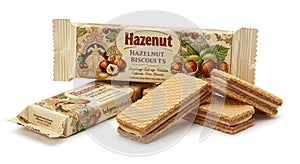 Packaging features hazelnut-themed design, showcasing rows of wafer biscuits filled
