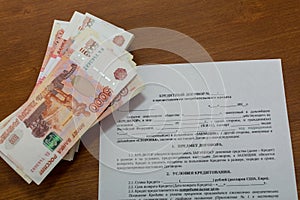 Packaging of five thousandth rouble Russian money and credit agreement