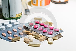 Packaging of tablets and pills on the table. Medicine