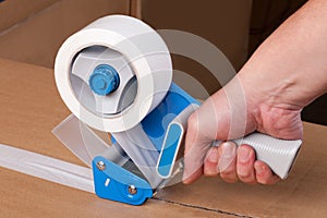 Packaging tape dispenser
