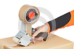 Packaging tape dispenser and shipping box
