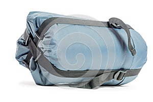 Packed a sleeping bag in gray on a white background