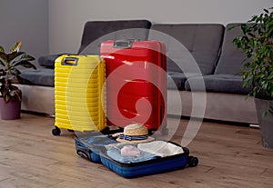 Packed suitcase with belongings . Travel concept