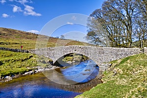 Packhorse bridge over river