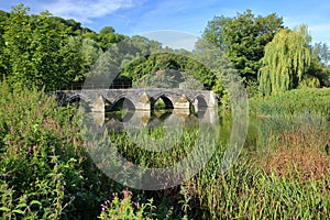 Packhorse Bridge on the river Avon at Barton Farm Country Park, Bradford on Avon, UK