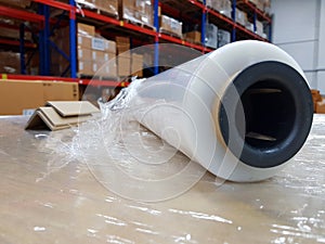 Packing accessories at workplace of industry,Stretch Wrap Industrial Strength,Roll of wrapping plastic stretch