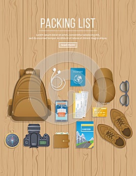Packing list. Preparing for vacation, travel, journey. Travel planning. Wooden table with baggage, air tickets, passport, phone.
