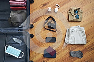 Packing suitcase for travel in new normal