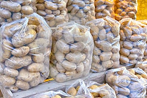 Packs of Fresh Potatoe on Display for Sale