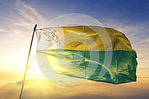 Paco do Lumiar of Brazil flag waving on the top sunrise mist fog