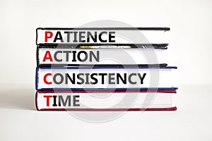 PACT patience action consistency time symbol. Concept word PACT patience action consistency time on books beautiful white