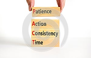 PACT patience action consistency time symbol. Concept words PACT patience action consistency time on blocks on white background.