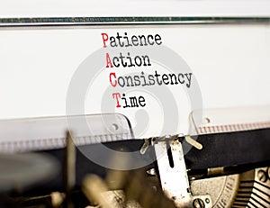 PACT patience action consistency time symbol. Concept words PACT patience action consistency time typed on the retro old