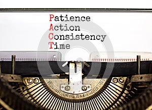 PACT patience action consistency time symbol. Concept words PACT patience action consistency time typed on the retro old