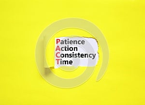 PACT patience action consistency time symbol. Concept words PACT patience action consistency time on white paper, yellow