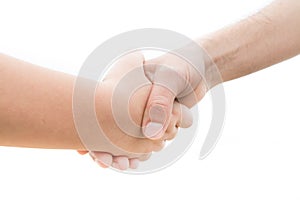 Pact between a youth and an adult with a handshake photo